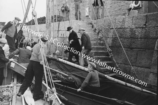 BOATS AND BOATMEN WITH LIFEBOAT TO INNISHMAAN CASHLA BAY  FR KILLEAN PP AND FR KEANE S.J.